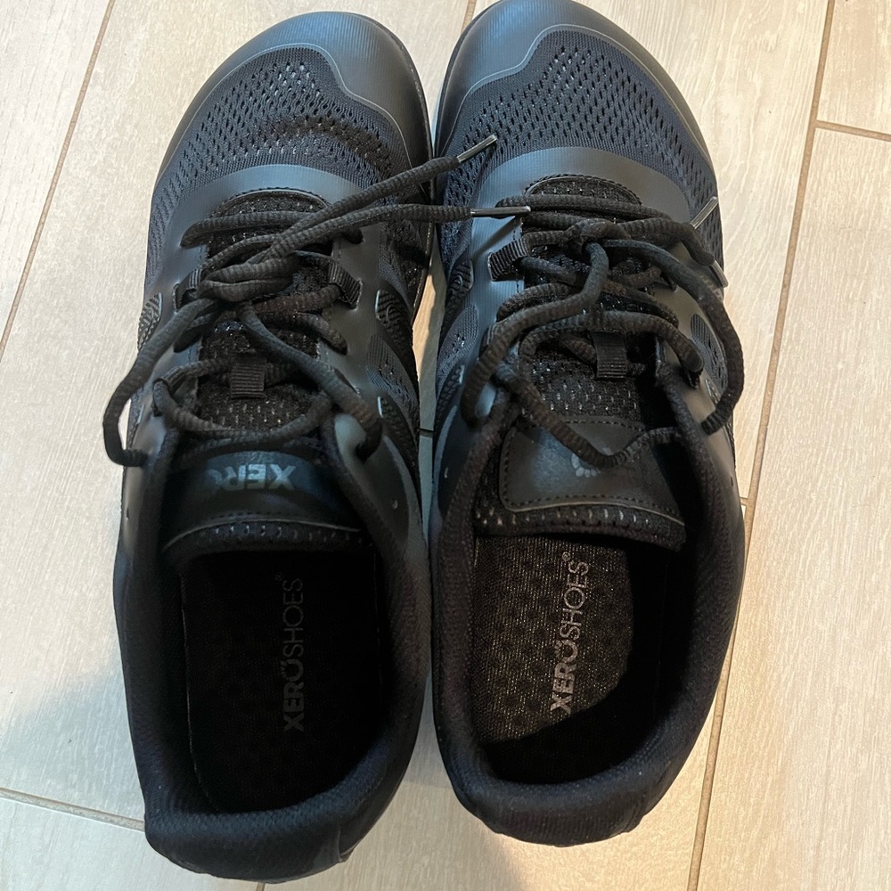 Black Athletic Shoes with Cushioned Soles and Mesh Upper